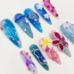 Alternative view of Press On Nails Jellyfish with Plumeria | 3D Floral Fake Nails in Long Almond | Handmade Summer Starfish Nail Art for Holiday, Vacation, Gift