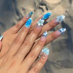 Alternative view of Press On Nails Blue Lagoon with Shell & Floral Art | Oceanic 3D Fake Nails in Medium Almond | Handmade Summer Nail Art for Holiday, Vacation