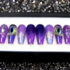 Purple coffin press on nails with sculpted dragon eyes rimmed in gold beads, iridescent scales and crystals