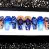 Deep blue ombré coffin press on nails with hand-painted portraits, white shells, bubbles and black bead chains