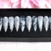 Grey marble stiletto press on nails with black ink veins, silver glitter feathered ridges and pearls