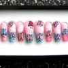 Pink coffin press on nails with painted clouds, blue and pink tips, hand-painted butterflies and rhinestones