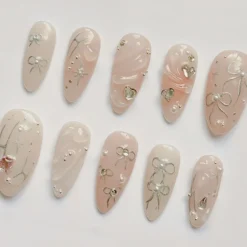Alternative view of Pastel Pink Gel Nails | Gel-Embossed Press On Nails with Elegant Designs | Natural Nail Art | Bow Nails | The Perfect Choice