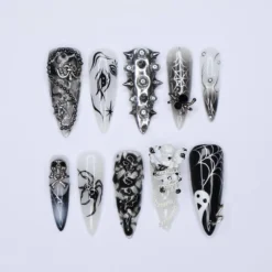 Black and Silver 3D Press-On Nails with Spikes, Chains, and Gothic Designs, Long Stiletto Nails for Halloween or Goth Fashion