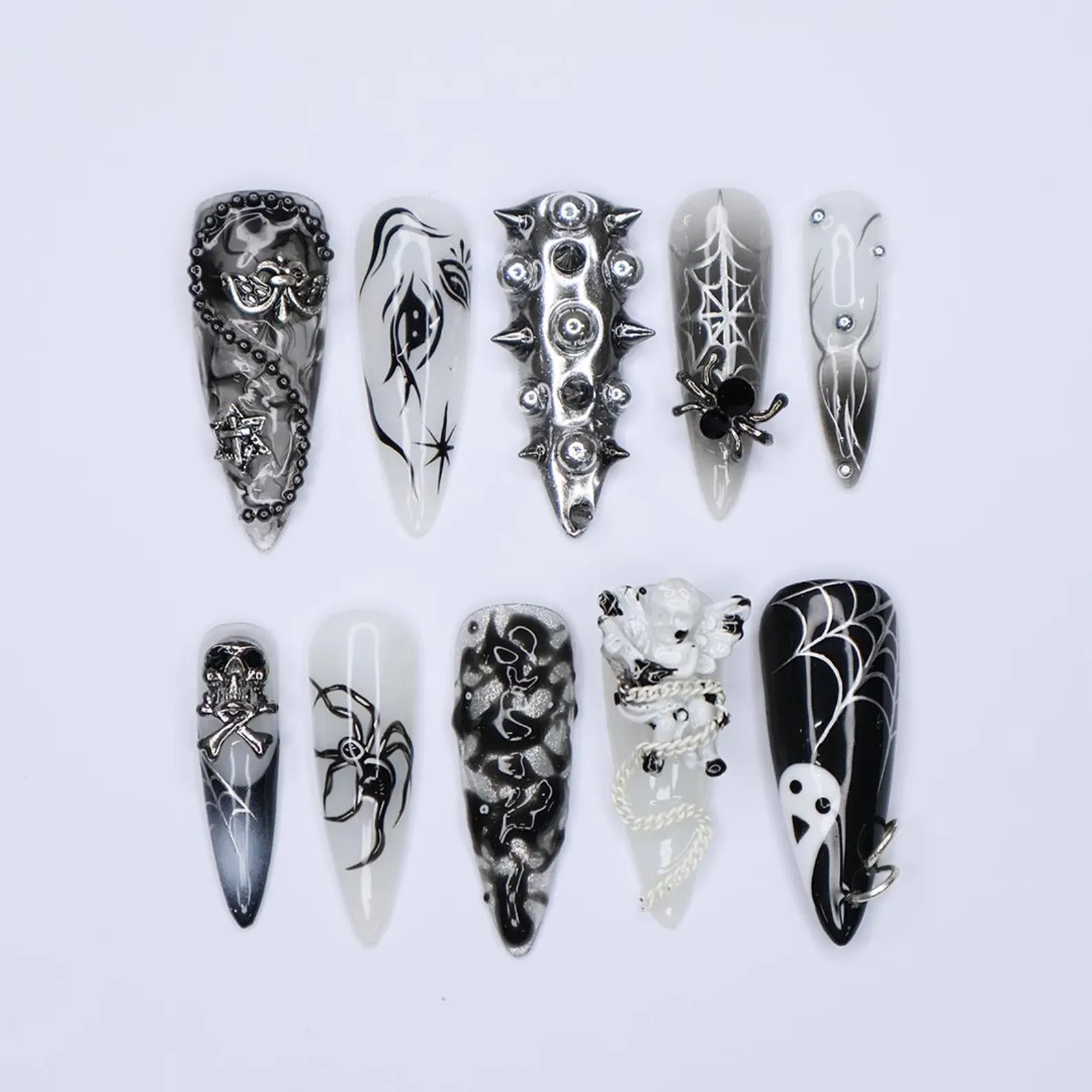 Black and Silver 3D Press-On Nails with Spikes, Chains, and Gothic Designs, Long Stiletto Nails for Halloween or Goth Fashion