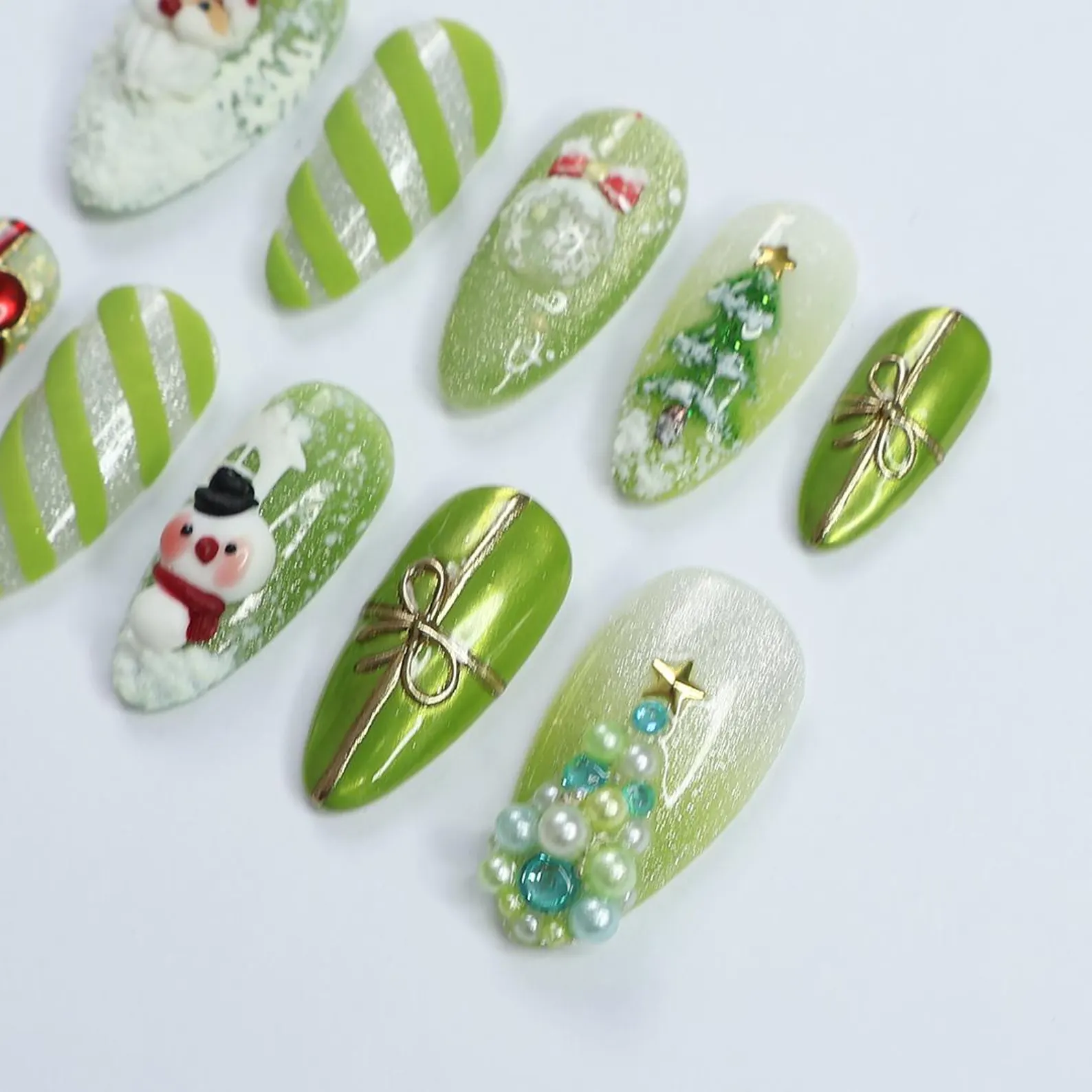Festive Green Medium Almond Press-On Nails: Adorned with Santa Claus, Snowman Designs - Perfect for Christmas Day or Gift for Her - Image 2