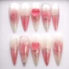 White to rose ombré stiletto press on nails with silver chrome lace, vines and a raised glossy pink heart
