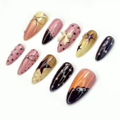 Alternative view of Gradient Sunset Polka Dot Press On Nails | Bow & Star Accents | Glossy Handmade Cute Nail Art | Playful Long Almond Press Ons