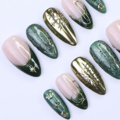 Alternative view of Christmas Press-On Nails in Green & Gold with Snowflake, Star and Moon Designs | Medium Almond Fake Nails | Handmade Holiday Nail Art