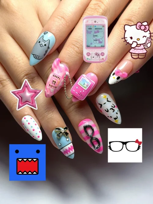 Pink and blue press-on nails worn on a hand, with a game console charm, a kitty face, glasses and stickers added to the photo