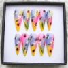 Pastel rainbow stiletto press on nails hand-painted with bees, ladybugs, white daisies and red tulips