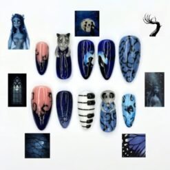 Dark fantasy gothic press-on nails in midnight blue and peach with a moonlit couple, piano keys and thorny vines