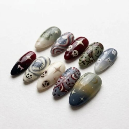 Halloween monster-themed press-on nails. Ghost and starry sky designs