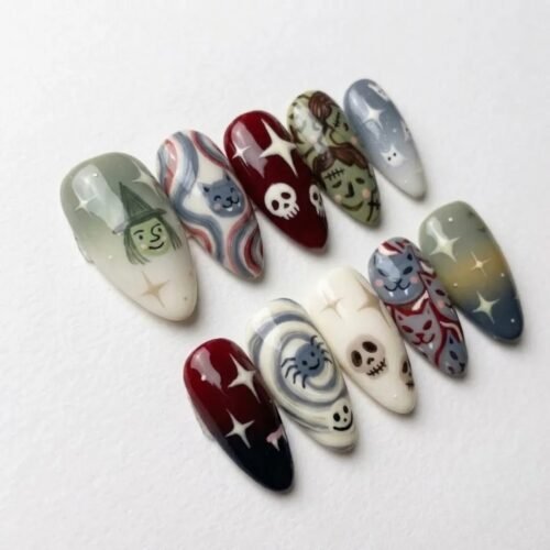 Press on nail designs featuring witch and spooky skull motifs.