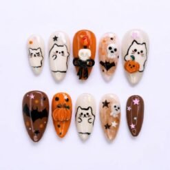 Ghost cat Halloween press-on nails in cream, orange and brown with a 3D pumpkin, a skull candle and a black bow