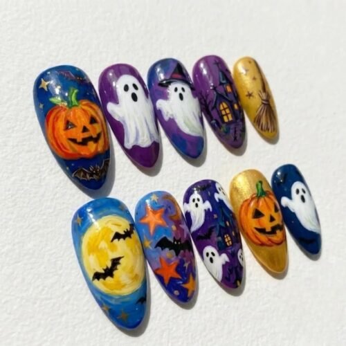 Hand-painted Halloween press-on nails featuring pumpkin and ghost designs.