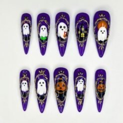Haunted ghost press-on nails in deep purple with 3D white ghosts in ornate gold frames, pumpkins and a haunted house