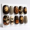 Press-on nails featuring straight-line and curved-line patterns.