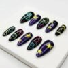 Press-on nails featuring sparkling stars in the galaxy.