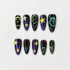 Purple galaxy Halloween press-on nails in shimmering violet and black with neon ghost outlines and raised yellow stars