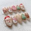 Press-on nails with Christmas tree designs