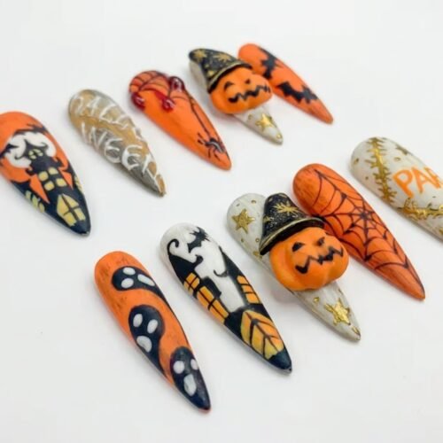 Press-on nails with a matte finish featuring ghost and black bat patterns.