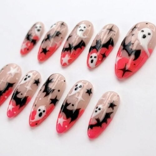 Black and white star press-on nails with black bats.