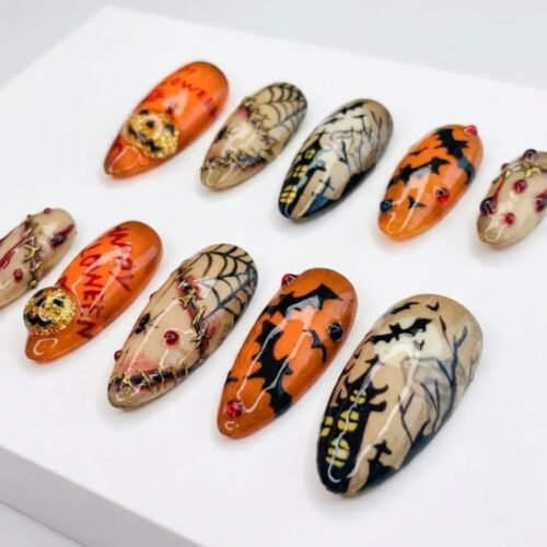 Press-on nails with a 3D dripping blood design.