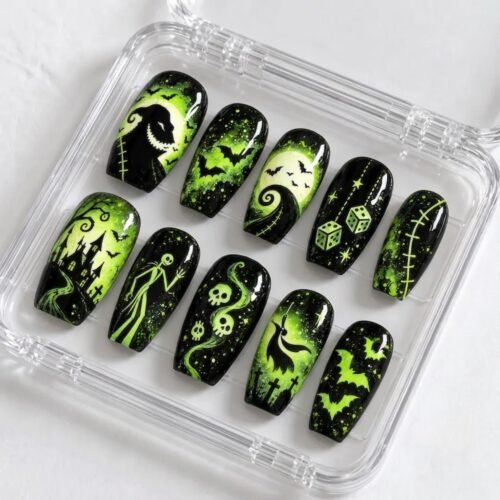 Press-on nails with black bat patterns