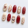 Press-on nails featuring the BTS logo and cherry blossoms.