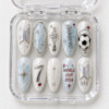 BTS soccer press-on nails in icy blue and pearl white with a football, stars, silver accents and number 7