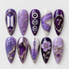 BTS galaxy press-on nails in purple and silver with constellation lines, glitter and a raised number 7