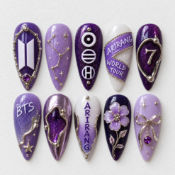 BTS galaxy press-on nails in purple and silver with constellation lines, glitter and a raised number 7