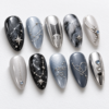 BTS press-on nails featuring the group's logo and the word "ARMY"