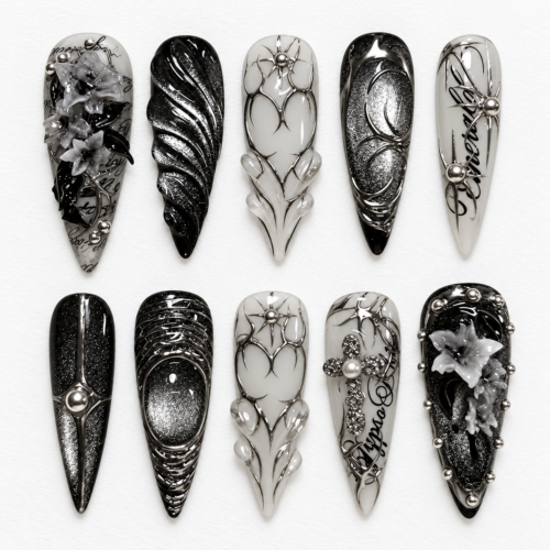 Black silver gothic press-on nails with smoky gray filigree, raised floral details, metallic textures and gem-like accents.