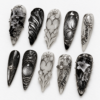 press-on nails with metallic filigree, web-like linework