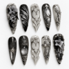 press-on nails with metallic filigree, web-like linework