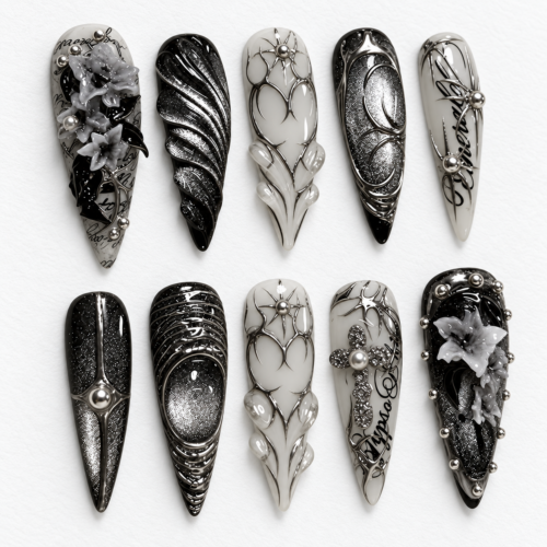 press-on nails with metallic filigree, web-like linework