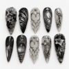 press-on nails with metallic filigree, web-like linework