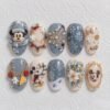 snowflakes, festive florals, mouse-character illustrations press on nails