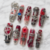 Gothic press on nails set with red black design, 3D snake, cross, and skull details