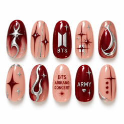 Burgundy concert BTS press-on nails with rose-nude accents, silver swirls, starbursts and fan-themed lettering.