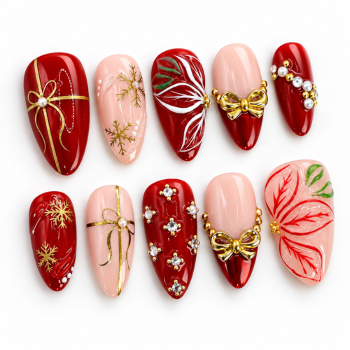 Press on nails with gold ribbon bows, snowflake bursts, leafy detail