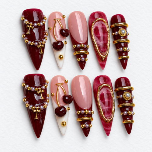 Framed gem-like centers, beadwork, chain accen press on nails