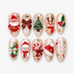 Champagne christmas press-on nails with Santa, a snowman, reindeer, a tree, holly, candy canes and snowflakes.