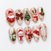 a reindeer, a Christmas tree, holly, a wreath, candy canes press on nails