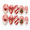 ed bow, candy-cane stripes, a decorated Christmas tree press on nails