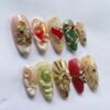 Press-on nails with elegant bauble designs