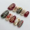 Press-on nails with decorative bauble patterns