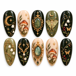 Dark forest celestial press-on nails with mushrooms, crescent moons, moths, botanicals and gold-tone accents.